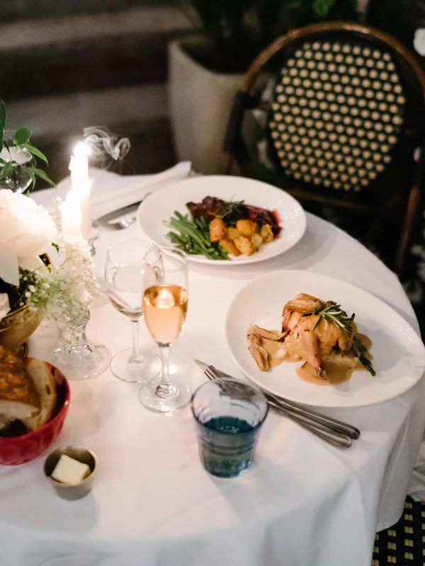 A table with food and wine on it